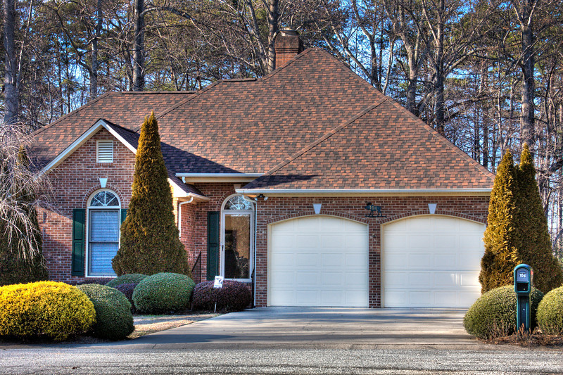Completed roof replacement project on a brick home in Gaston County NC
