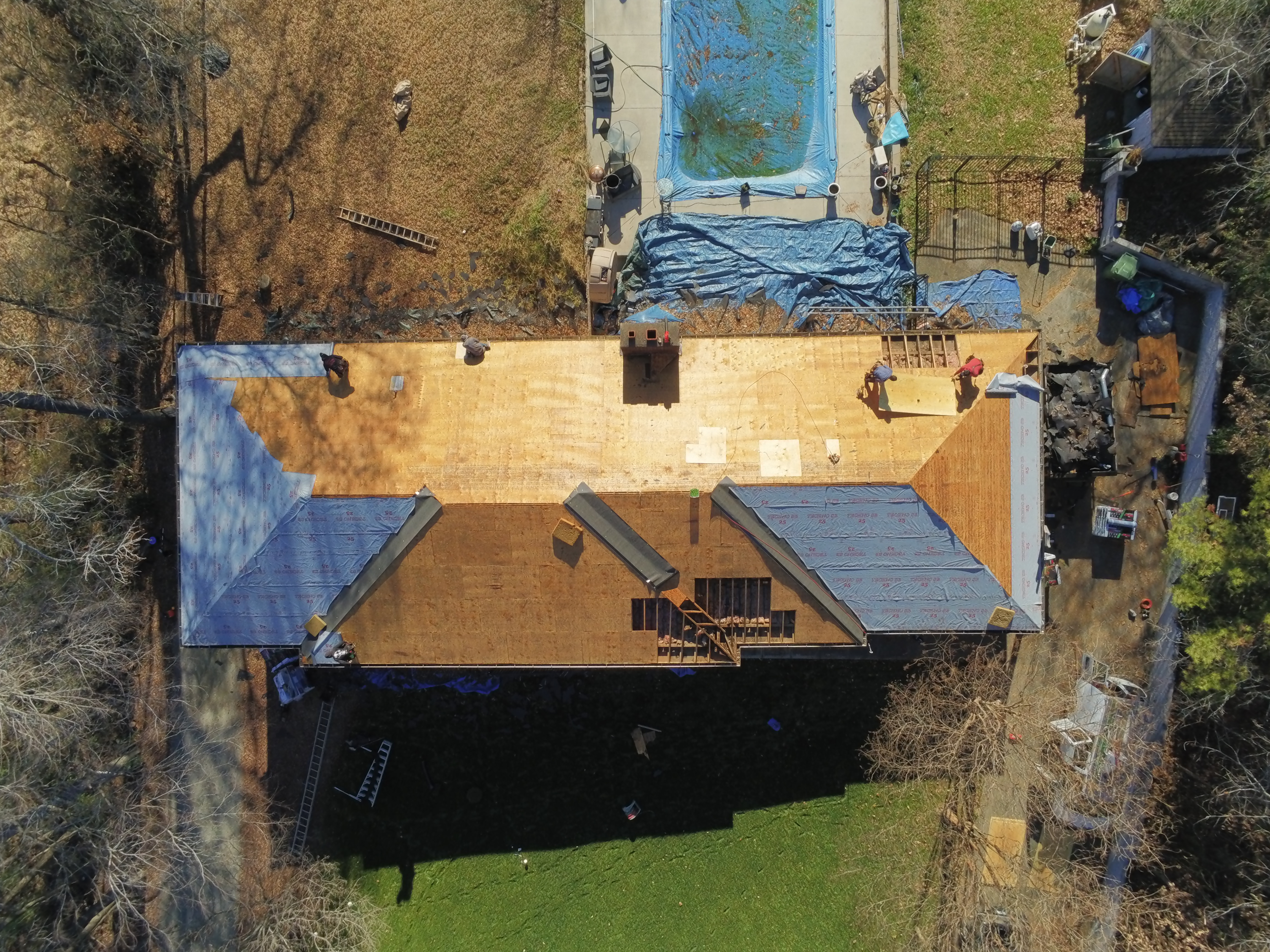 Roof replacement in progress with aerial drone overview in Gaston County NC
